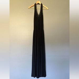 Black beaded halter neck maxi dress w/ silver sequins
Niki Livas
Size: 8
